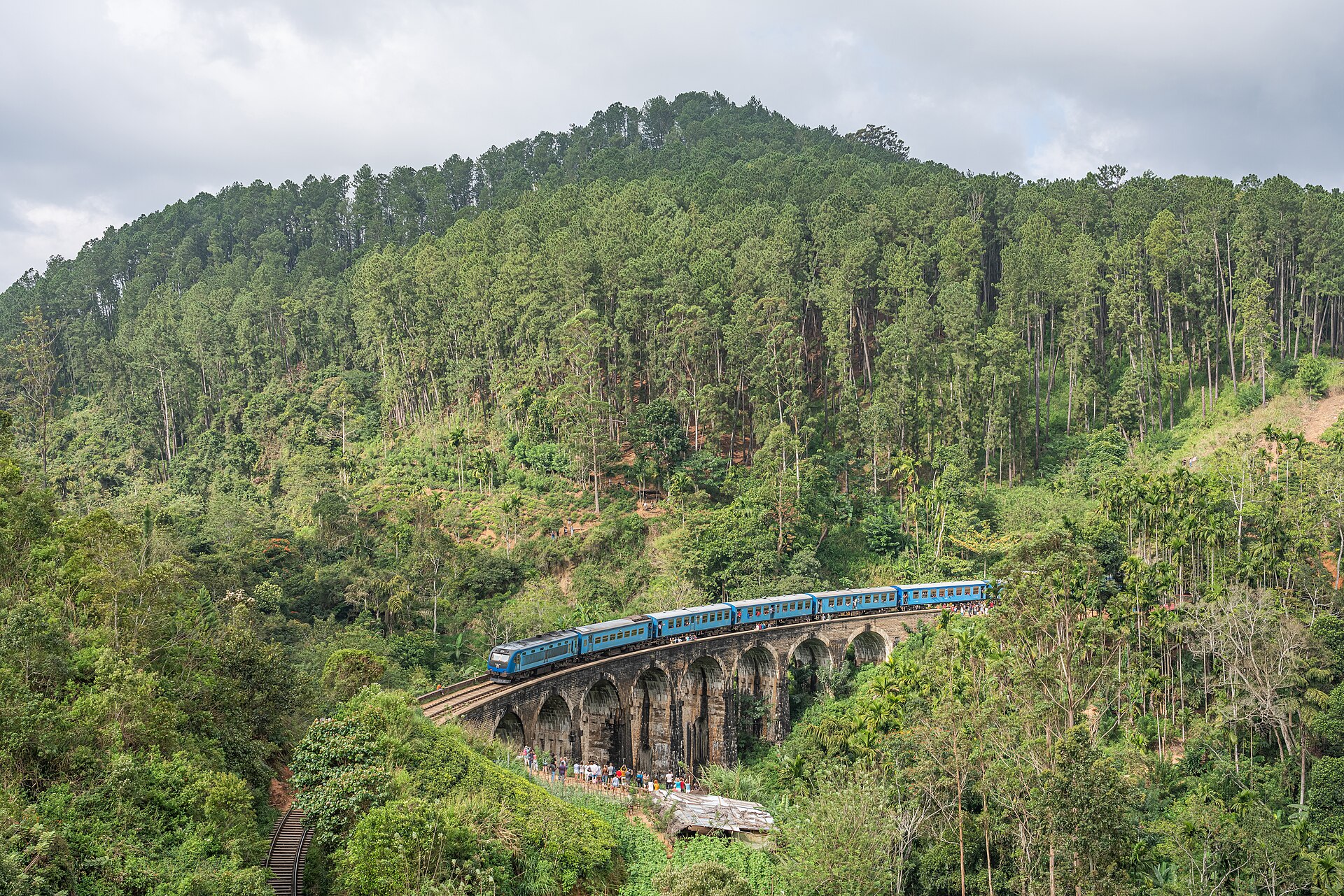 Nine Arches Bridge curving through the green hills near Ella, Sri Lanka